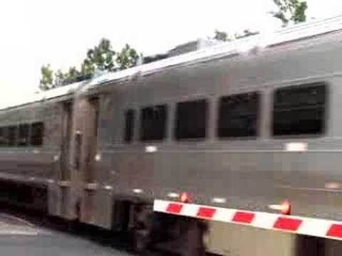 The NJ transit pulls out of Radburn heading to Hoboken.