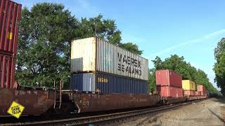 NS 7705 (GE ES44AC) leads NS 228