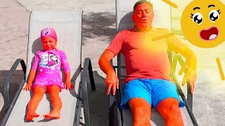 Milusik and papa playing with a cheerful sun