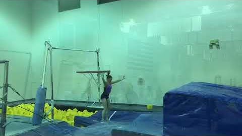 Full twisting bars dismount on mats