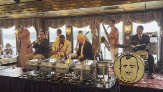 Watch the T.J. Muller’s Jazz-O-Maniacs play on the Celebration Belle