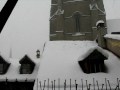 Ref:QZAEIDd7nB0 Fribourg, switzerland - view of snow from apartment 59, grand-rue