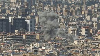 Explosions rock Beirut as plumes of smoke fill the sky