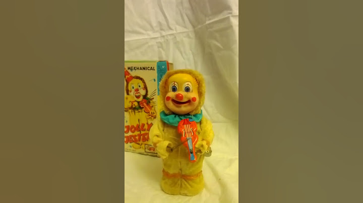 Clown/Jester playing the violin. Rosko wind up toy