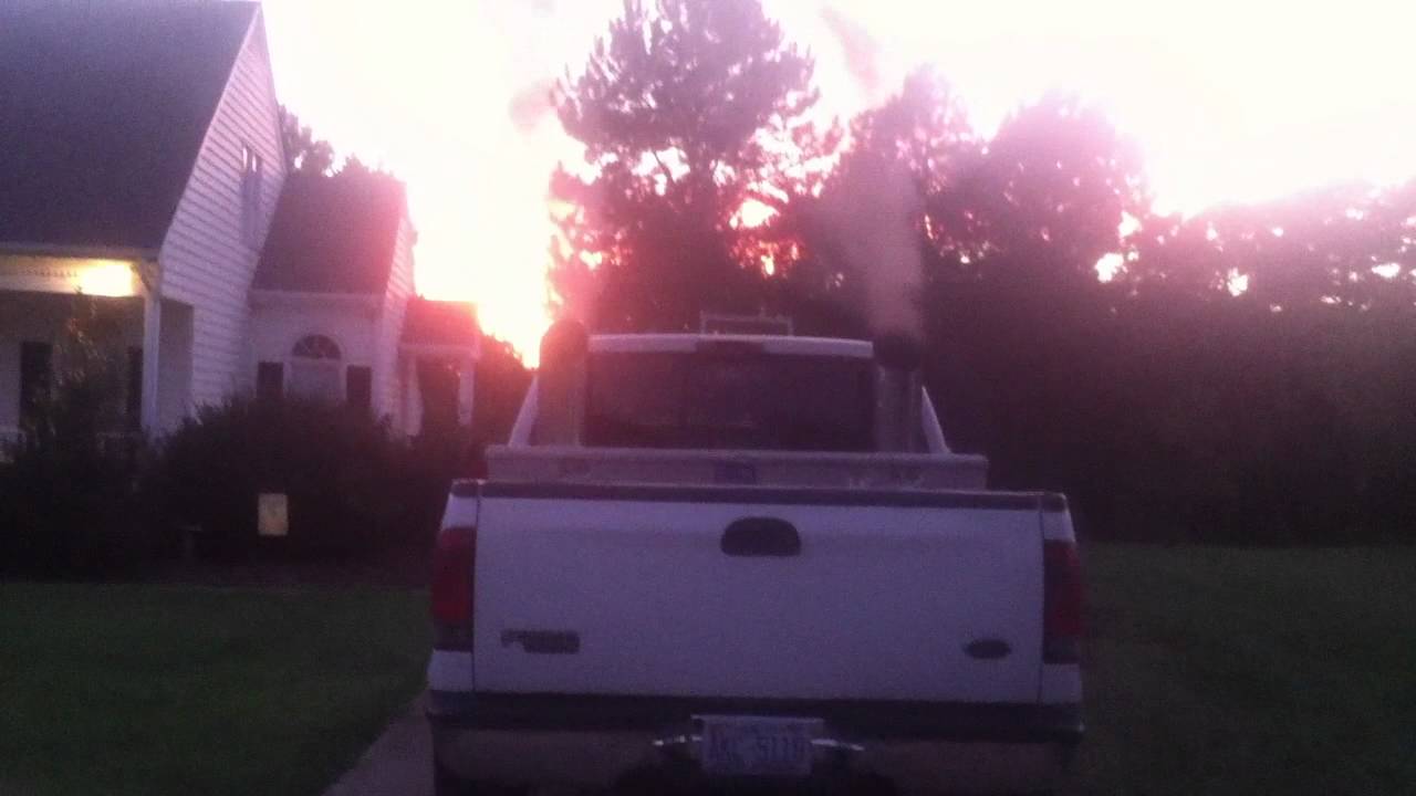 2003 Ford F-250 with 8 inch stacks rolling some coal - YouTube