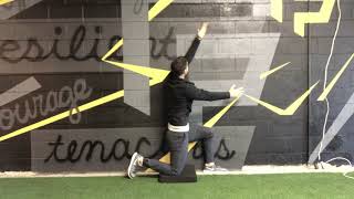 1/2 kneeling T-spine windmill against wall