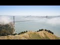Timelapse of advection fog rolling in under the Golden Gate Bridge, San Francisco