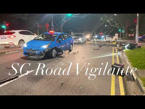 19Aug2022 ComfortDelGro Taxi fail to conform to red light signal crash motorcyclist turning right