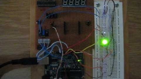 Arduino with 7 segment display, temperature sensor and LEDS