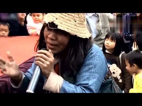 广西乞丐唱《下定决心忘记你》火了火了？