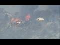 Brush fire threatens homes in La Habra Heights