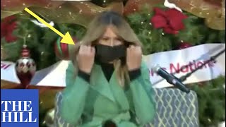 First Lady Melania Trump removes mask to read to young patients at hospital