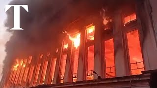 Fire engulfs historic post office in Manila