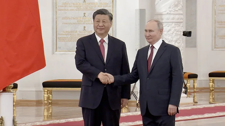Xi attends welcoming ceremony held by Putin
