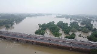 Drone footage shows swollen river flooding southern India after heavy rain