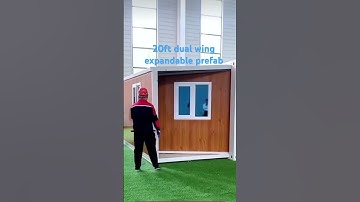 Prebuit 20ft prefab double wing expandable container house with wood grain exterior. #modularhouse