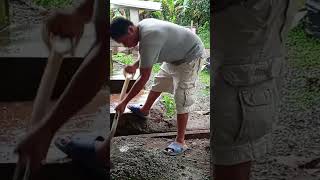 Mixing cement with aggregate for concrete post. | #shortvideo | #shorts