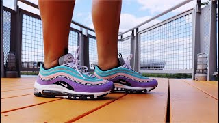 have a nike day air max 97 on feet