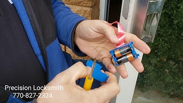 Changing batteries on an Alarm lock Trilogy 1300 series.