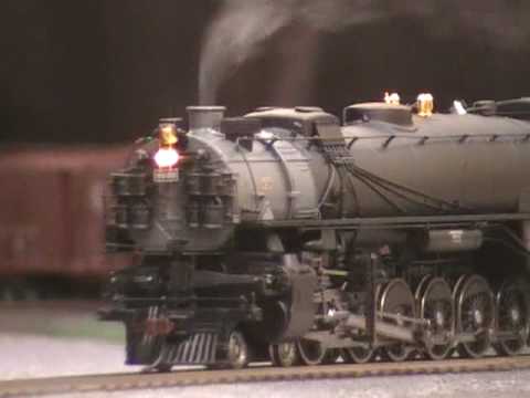 MTH UP 4-12-2 #9000 HO steam engine leads stock cars. - YouTube