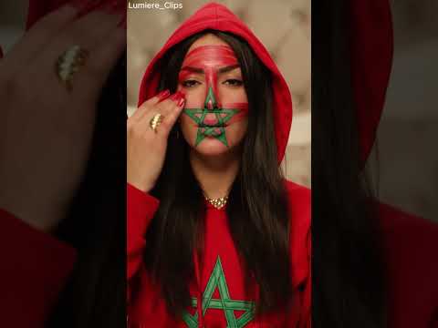 الفخر المغربي كيطلع من القلب حتى للوجه بسترة حمراء ونجمة خضرا فوق القلب Maroc 