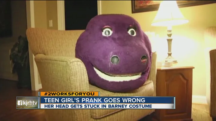 WATCH: Teen gets Barney head from costume stuck on...