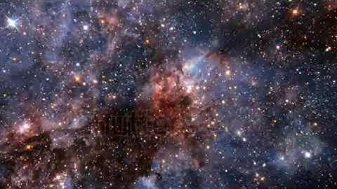 seamless loop galaxy exploration through outer space towards glowing milky way galaxy.