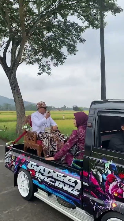 Rare moment of modified pick up carrying groom