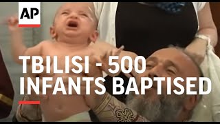 500 infants baptised in mass Orthodox ceremony