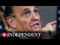 Rudy Giuliani's hair dye drips down his face during press conference