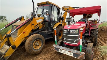 Jcb 3dx Backhoe Loader Machine Loading Mud in Mahindra Yuvo 475 Di And Mahindra 265 Di Tractor | Jcb