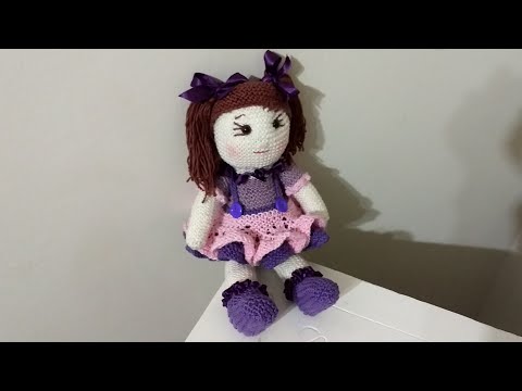 Vídeo: Como Tricotar Uma Boneca