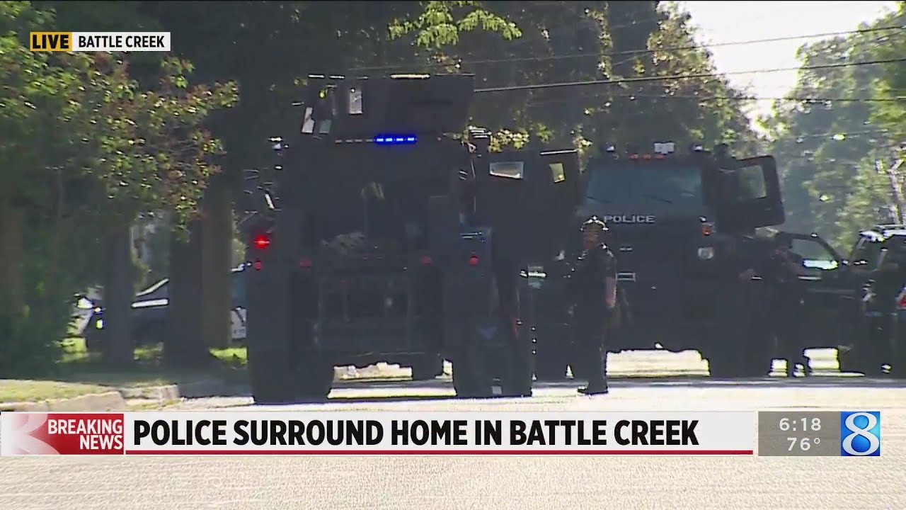 Police work to get man out of Battle Creek home - YouTube