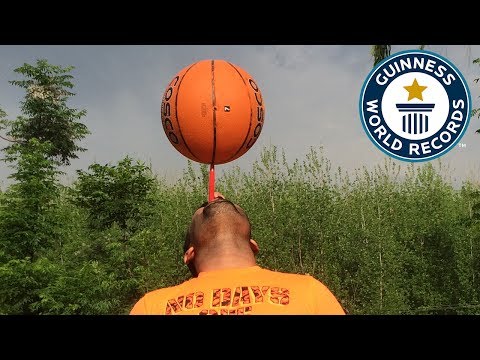 Longest time spinning a basketball on a toothbrush - Guinness World Records
