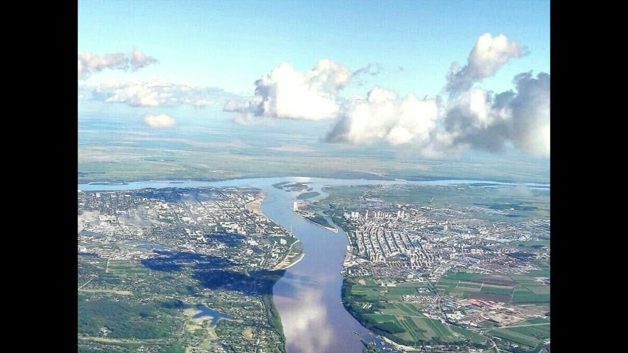 Амур бурея зея относятся к рекам. Река Амур Благовещенск. Набережная реки Амур Благовещенск. Зея впадает в Амур. Слияние Амура и Зеи.