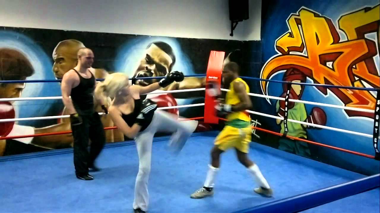 Female Boxing in ring with man USF Boxe Française Savate Mixed Boxing Woman Girl fight