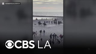 Hundreds arrested after unruly Fourth of July crowd draws massive police response in Newport Beach
