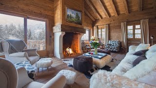 The sound of burning firewood in the fireplace. Log cabin in the snowy mountains.