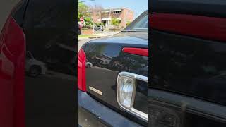 Showing where the starter located on a 02 Cadillac Deville