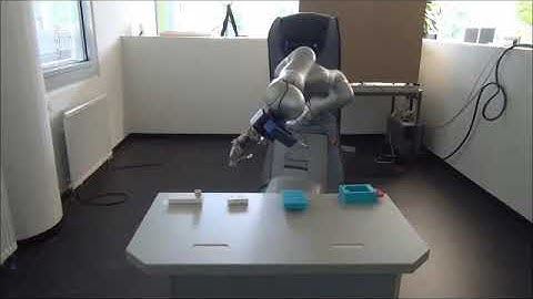 A Mobile Manipulation robot performs an assembly task