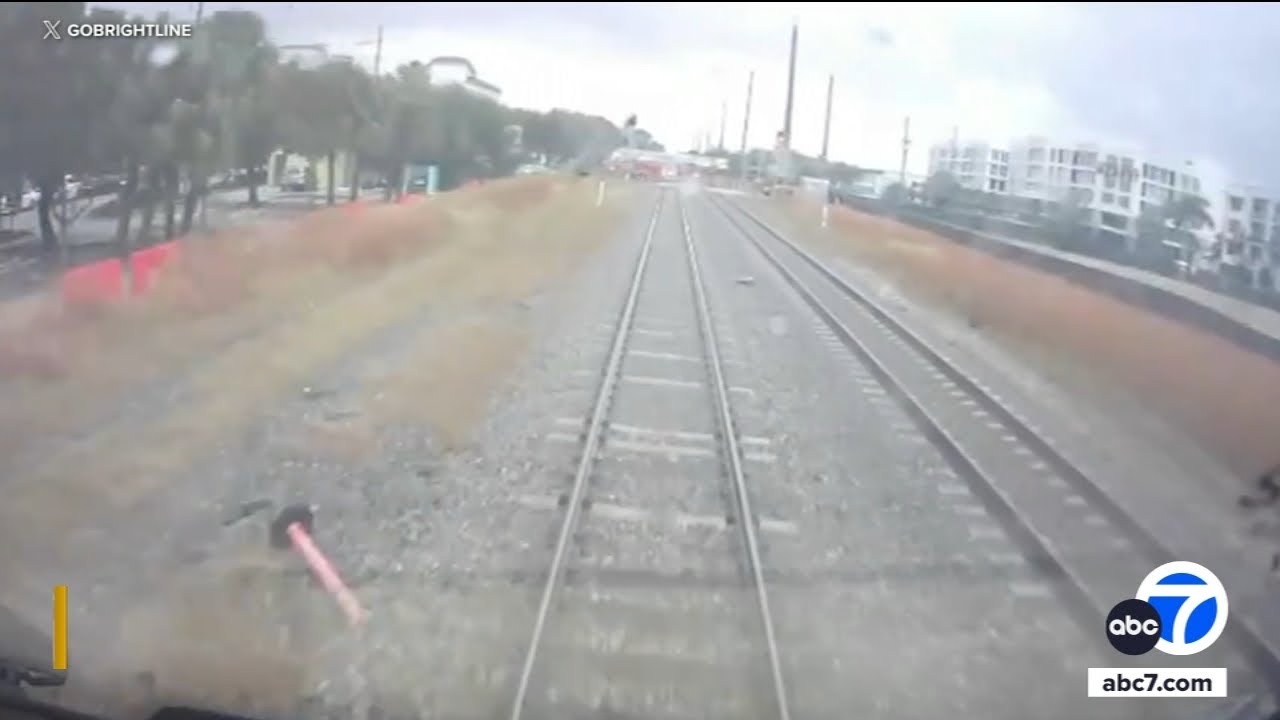 Train collides with fire truck in Florida, video shows - YouTube