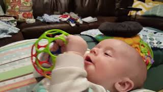 3 Month Old Baby Chewing on Toy