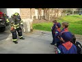 Fort Walton Beach firefighter giving a tour to Tiger Cubs from Pack 527