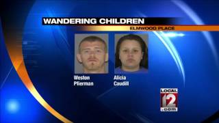 Parents arrested after children found wandering
