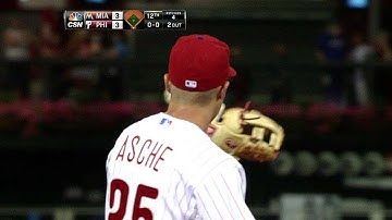 Asche dives to snare a grounder at third