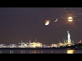 Three moons and a statue  a moonstack timelapse of the crescent moon half full and full moon