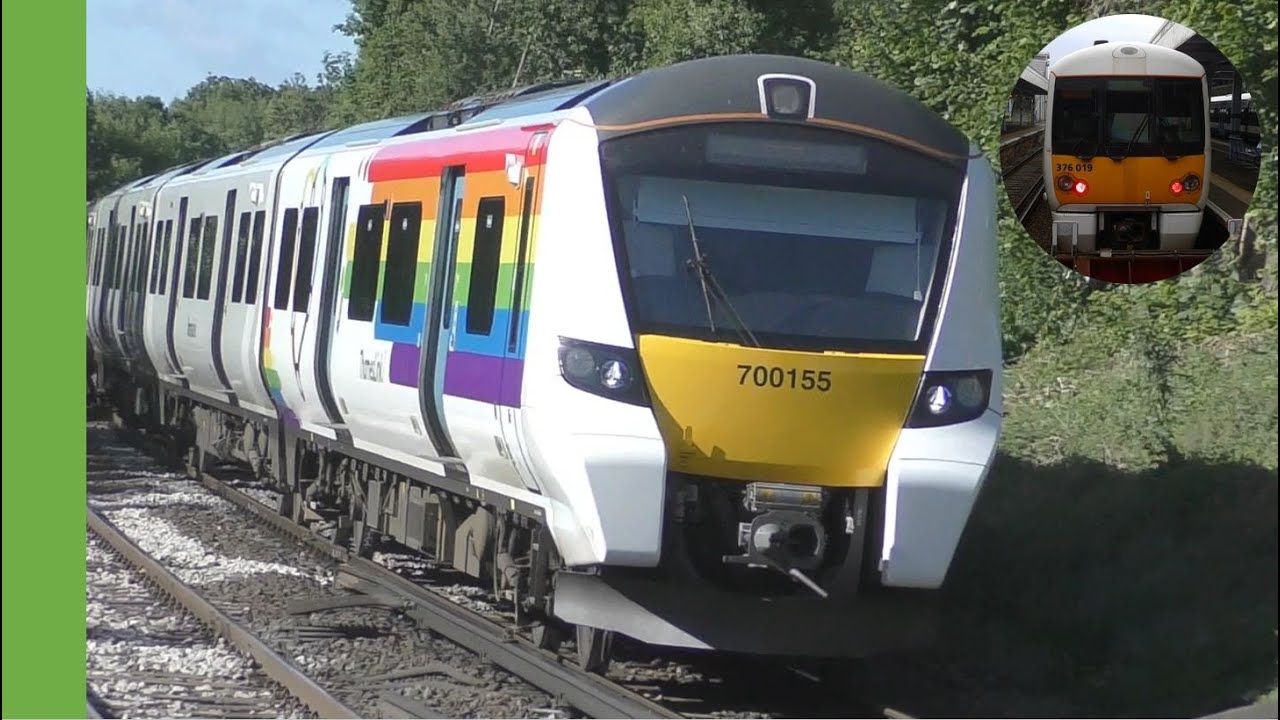 Pride livery Class 700 passes Merstham