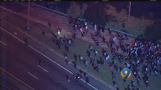 MINUTE-BY-MINUTE: Protesters march in uptown Charlotte Friday night