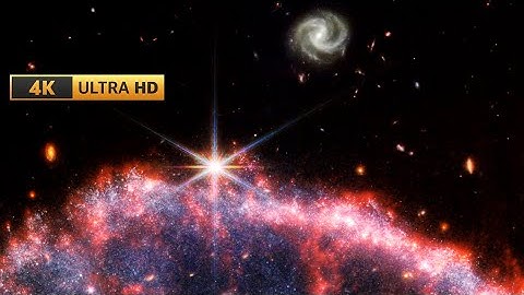 Galaxy Rise Over the Cartwheel Galaxy 4K UHD (NASA James Webb Space Telescope - JWST)