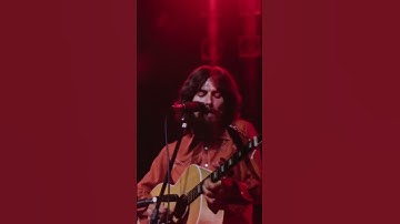 Thumbnail of George plays "Here Comes The Sun" to a sold out audience at The Concert For Bangladesh